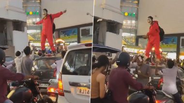 Man Blew Notes In Jaipur: Money Heist स्टाइल मास्क घातलेल्या तरुणाने गाडीवर चढून हवेत केला नोटांचा वर्षाव, Watch Viral Video